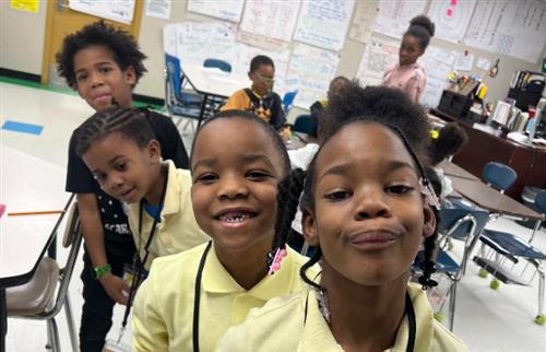 Students posing for math bee competition